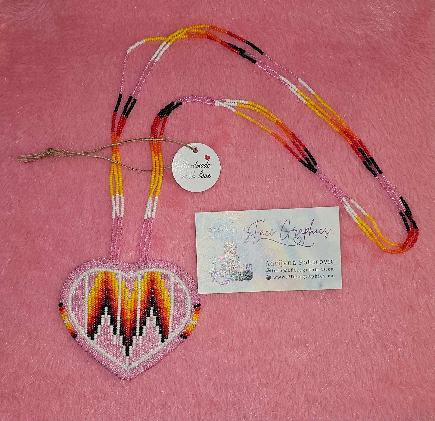 Pink heart medicine medallion