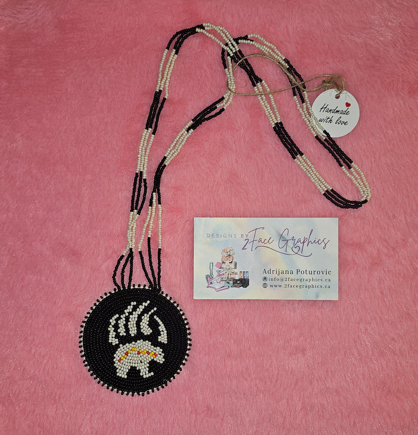 Black Bearpaw medallion