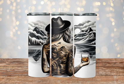 Black and white western girl drinking whisky watching mountains