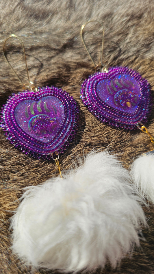 Purple beaded bear claw with rabbit fur pompom